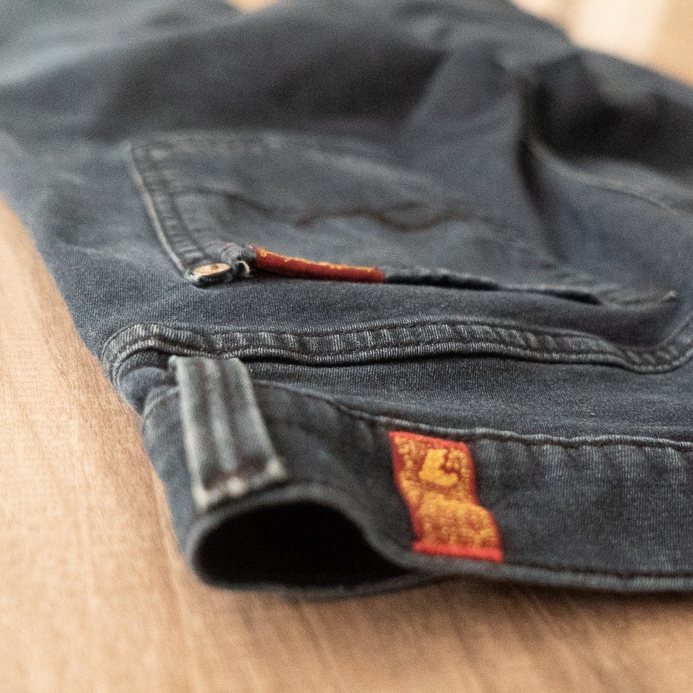 7 For All Mankind dark color jeans. Size 31 WOMENS